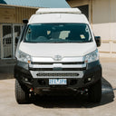 A white Toyota van with aluminium roof conversion