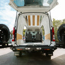 Toyota HiAce SLWB interior with pop top roof conversion and wood detailing