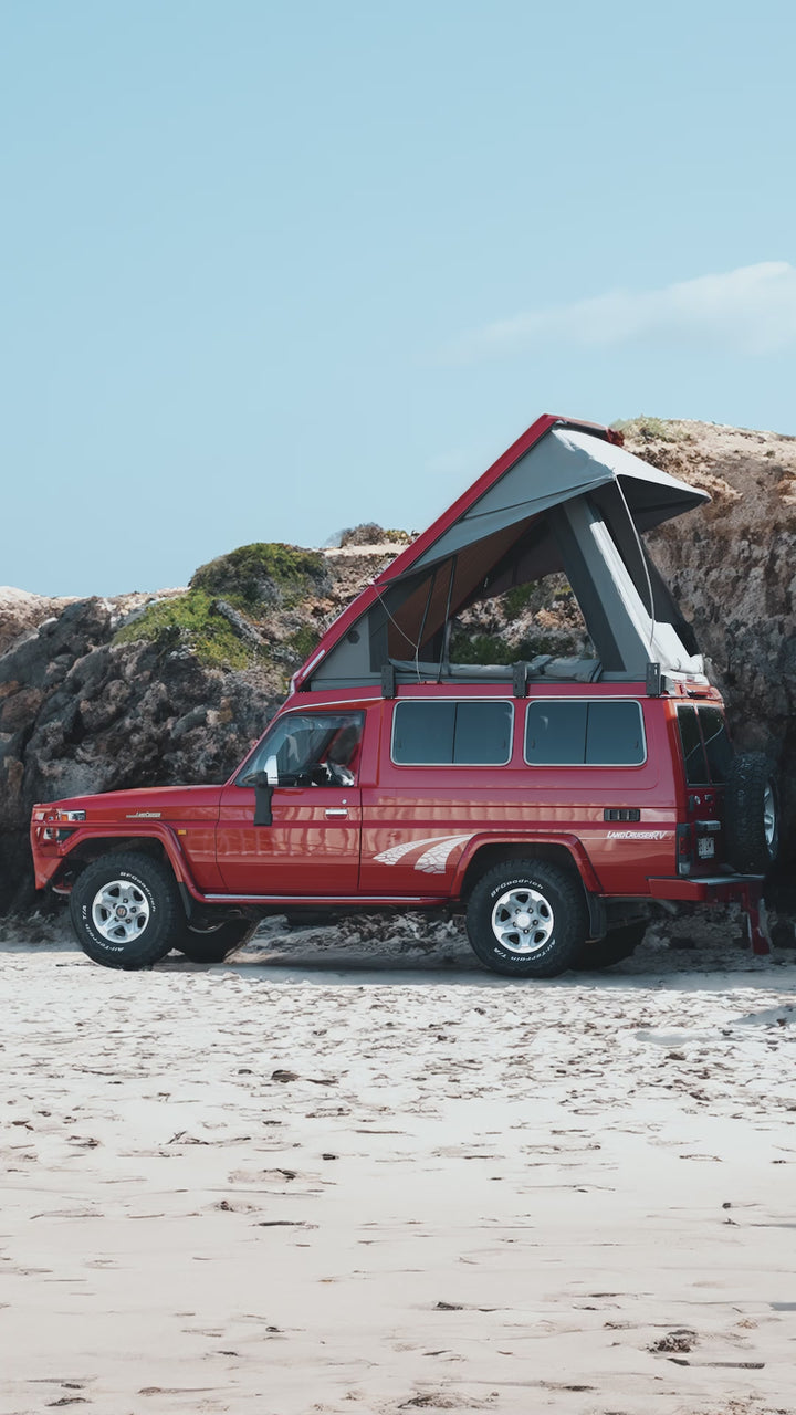 Red vehicle on beach - instagram reel video