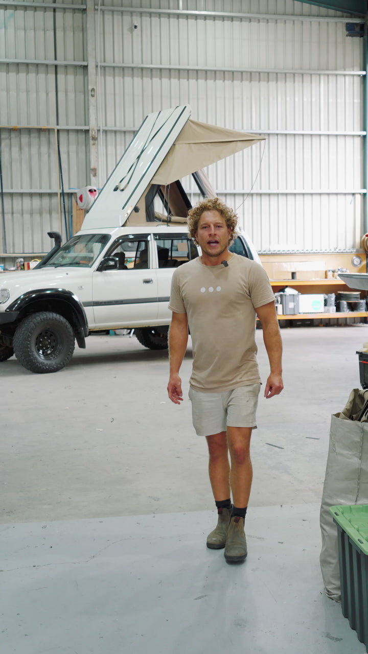Man explaining the Toyota 80 series vehicle.